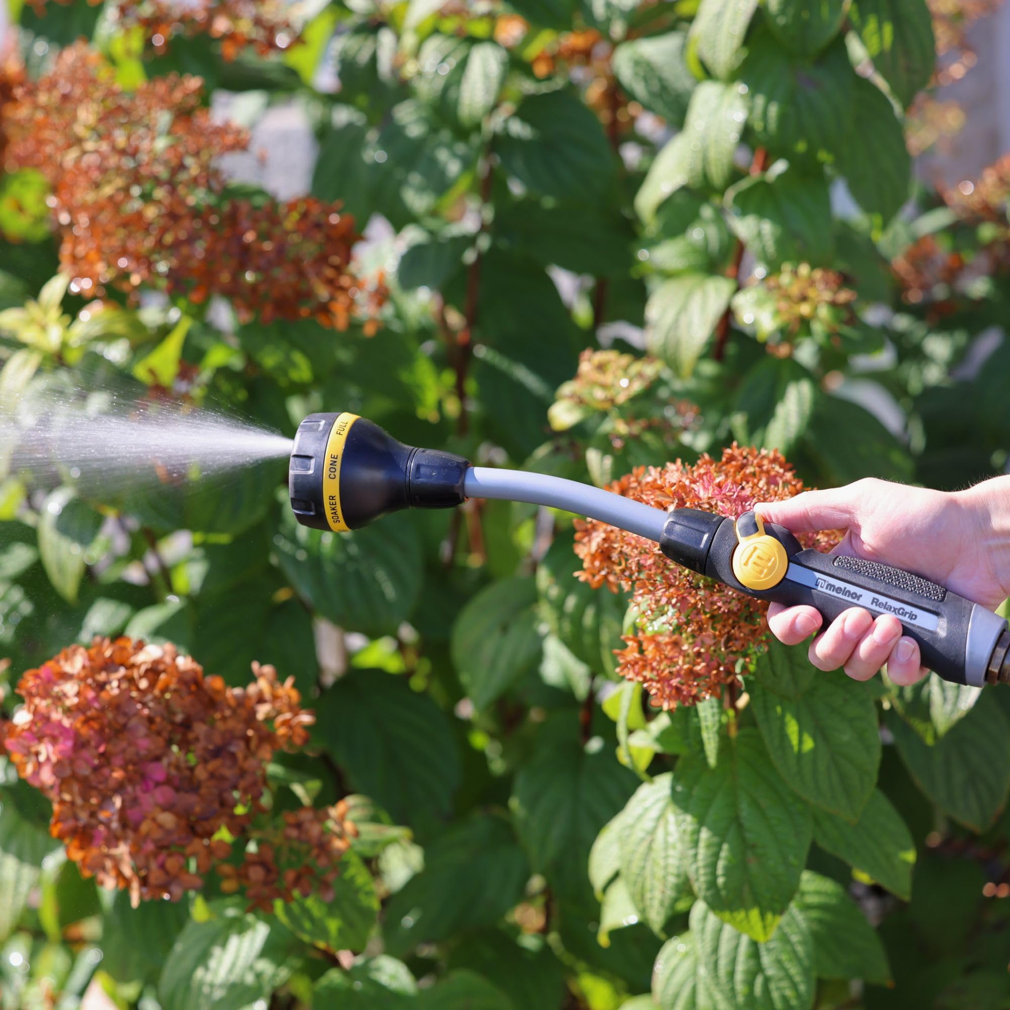 Melnor Relax Grip 15-inch wand helps rinse debris from the deck.