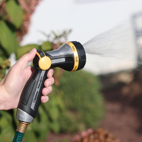Melnor RelaxGrip waters porch petunias with gentle spray