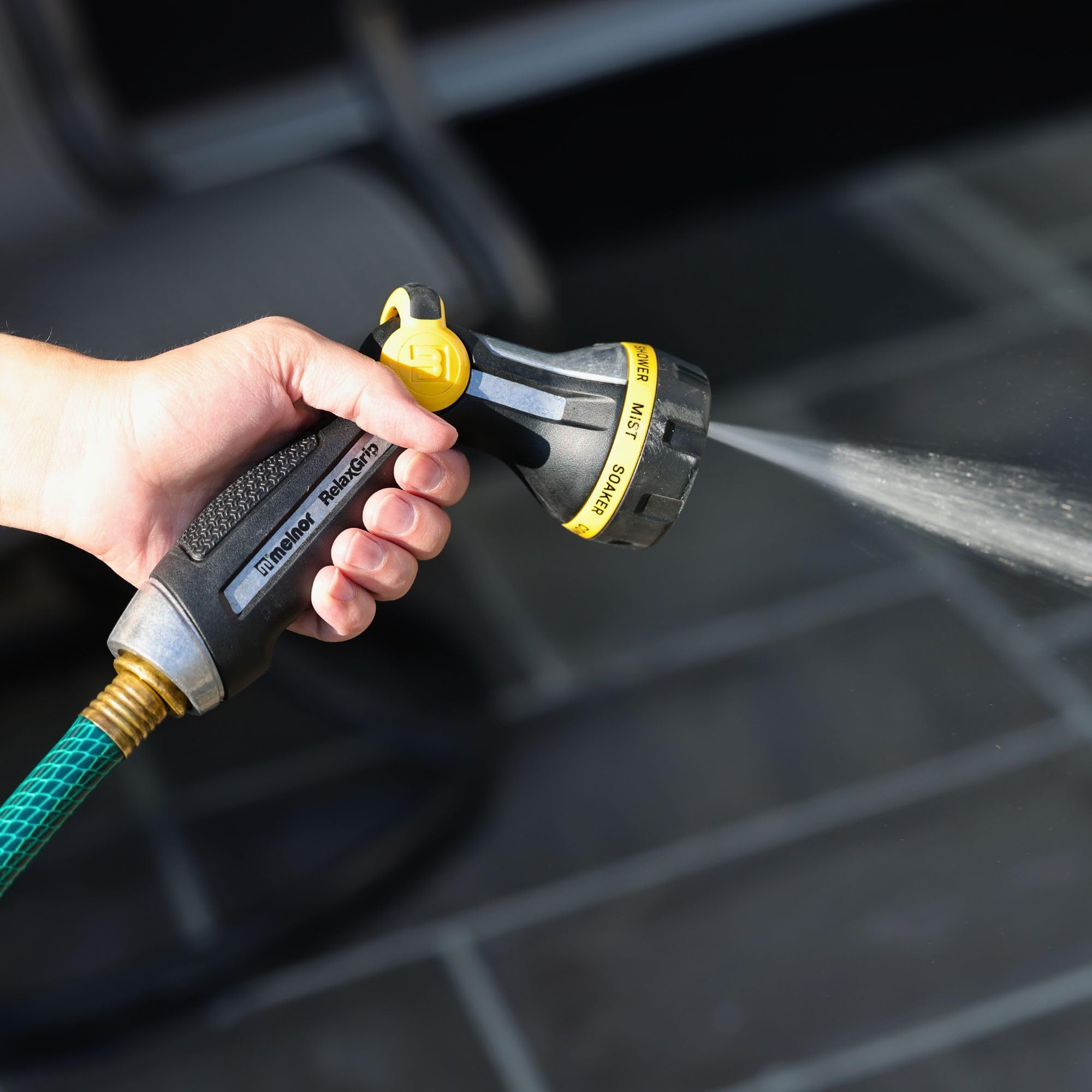 Melnor RelaxGrip used to rinse sidewalk with strong spray