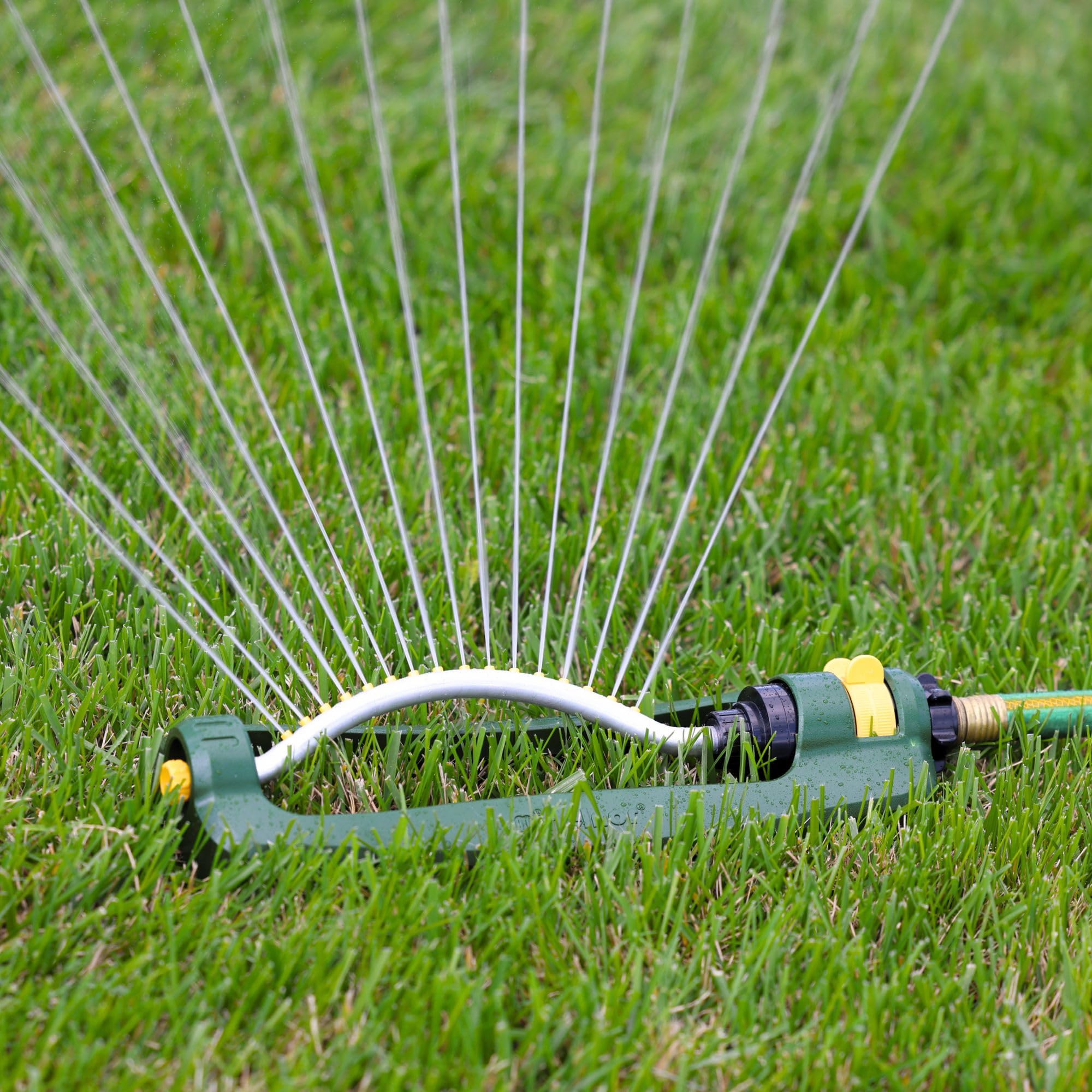 Sprinkler beside hose end shows QuickConnect compatibility and easy setup.