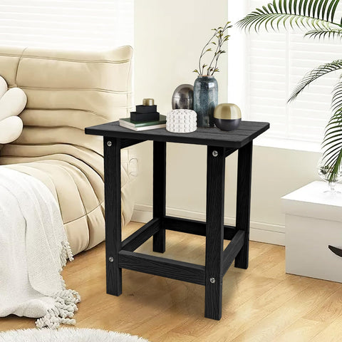 Meluvici black outdoor side table on a patio setting.