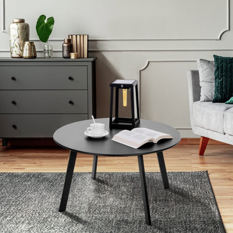 Meluvici weather-resistant metal table with anti-rust finish outdoors.