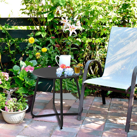 Meluvici round end table with metal frame, sturdy for garden seating.
