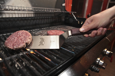 Mercer Culinary Hell's Handle turner, heat resistant up to 450°F, stays cool.
