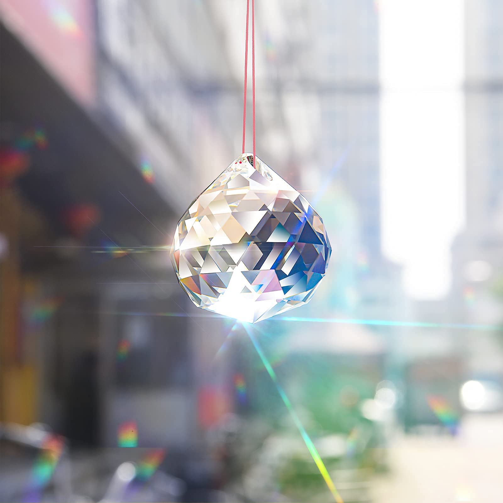 MerryNine chandelier prism ball enhances decor with sparkling light.