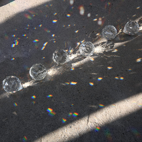 MerryNine K9 prism beads create sparkling light effects for displays.
