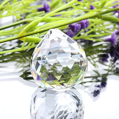 MerryNine top K9 crystal ball closeup showing flawless facets for sparkle.