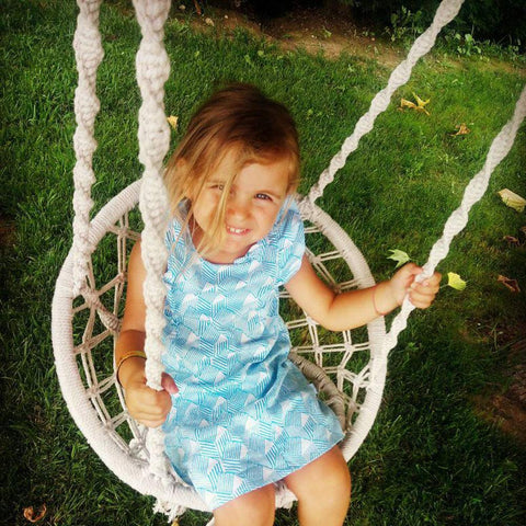Mertonzo knitted macrame swing chair detail with handcrafted texture.