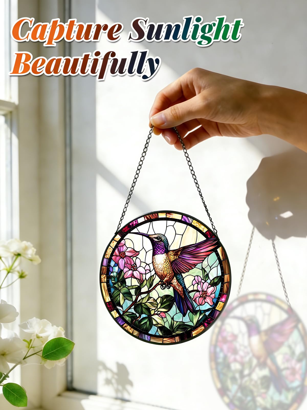 Meyocky sunlit display creates rainbow patterns from the hummingbird suncatcher