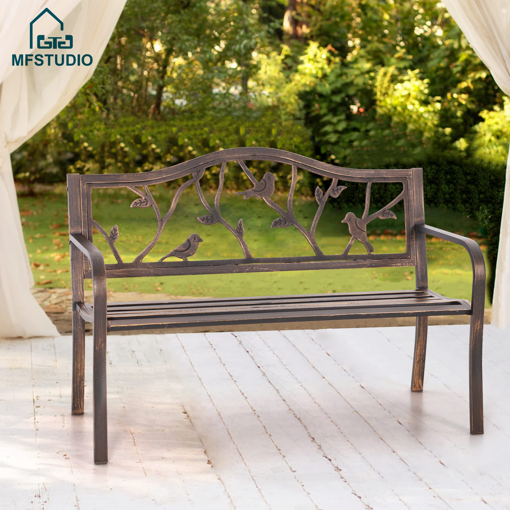 Patio bench by MFSTUDIO with bronze metal frame for timeless outdoor seating.