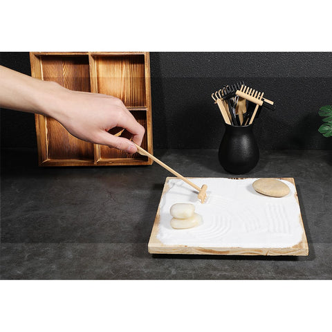 Six-piece MHYGKTXRA set supports varied tactile arrangements on a compact sandbox.