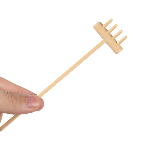 Elegant black MHYGKTXRA zen garden rake complements modern workspace decor.