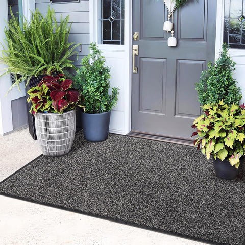 Mibao dirt-trapper front door mat catching mud at the entry