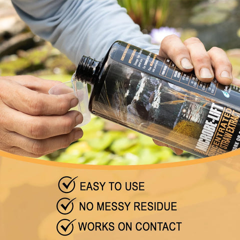 Pouring MICROBE-LIFT concentrate for year-round pond maintenance and clarity.