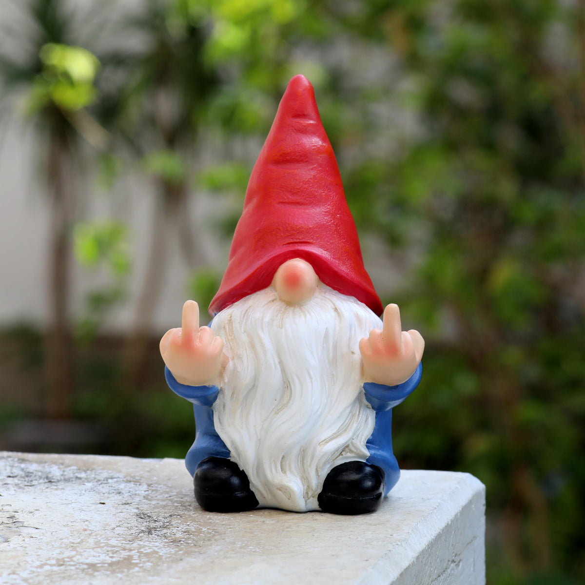Middle Finger Gnome 5.1-inch outdoor decor adds cheeky personality to your lawn.