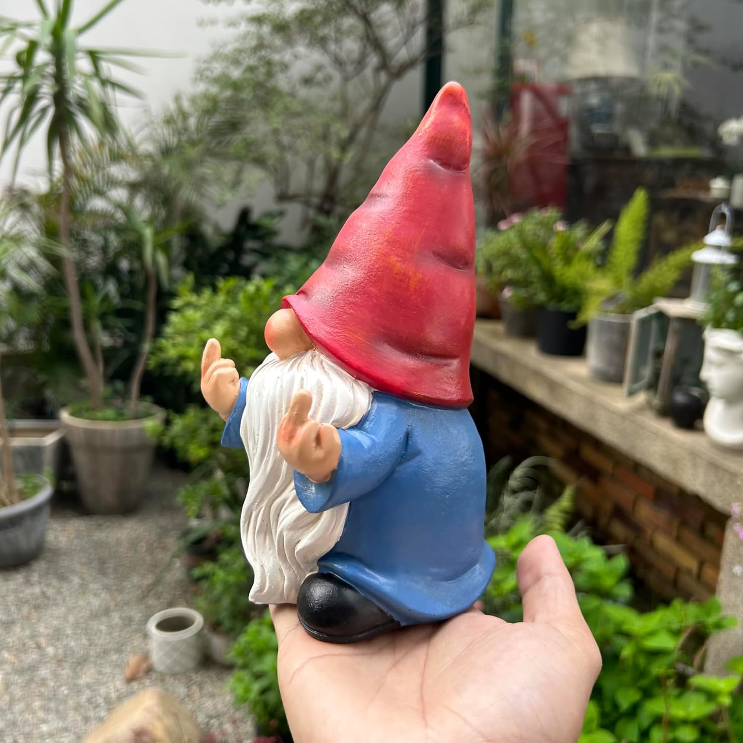 Middle Finger Gnome hand-painted sculpture ready for outdoor display and garden humor.