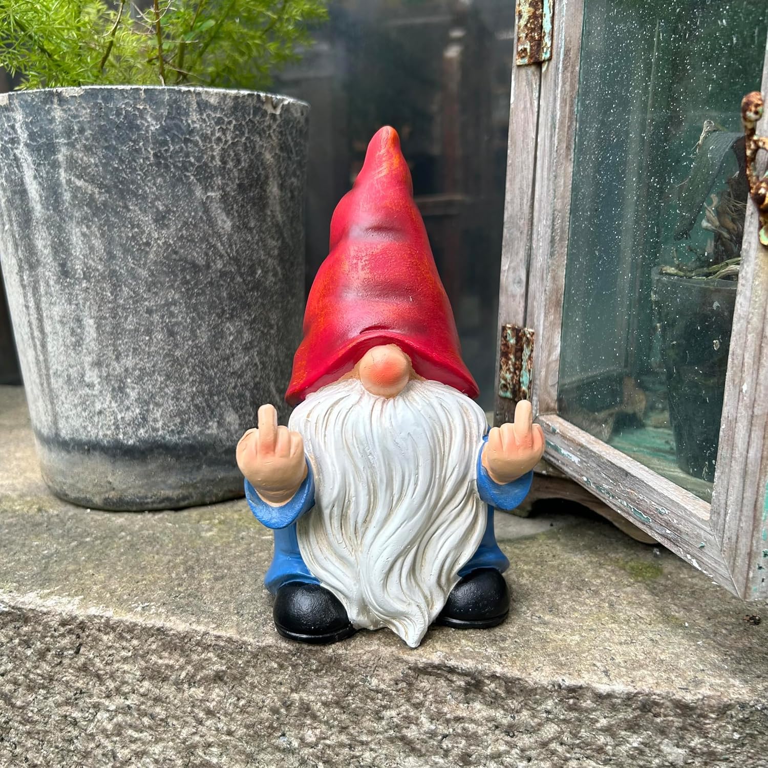 Middle Finger Gnome features lead-free paint and hand-painted accents for lasting charm.