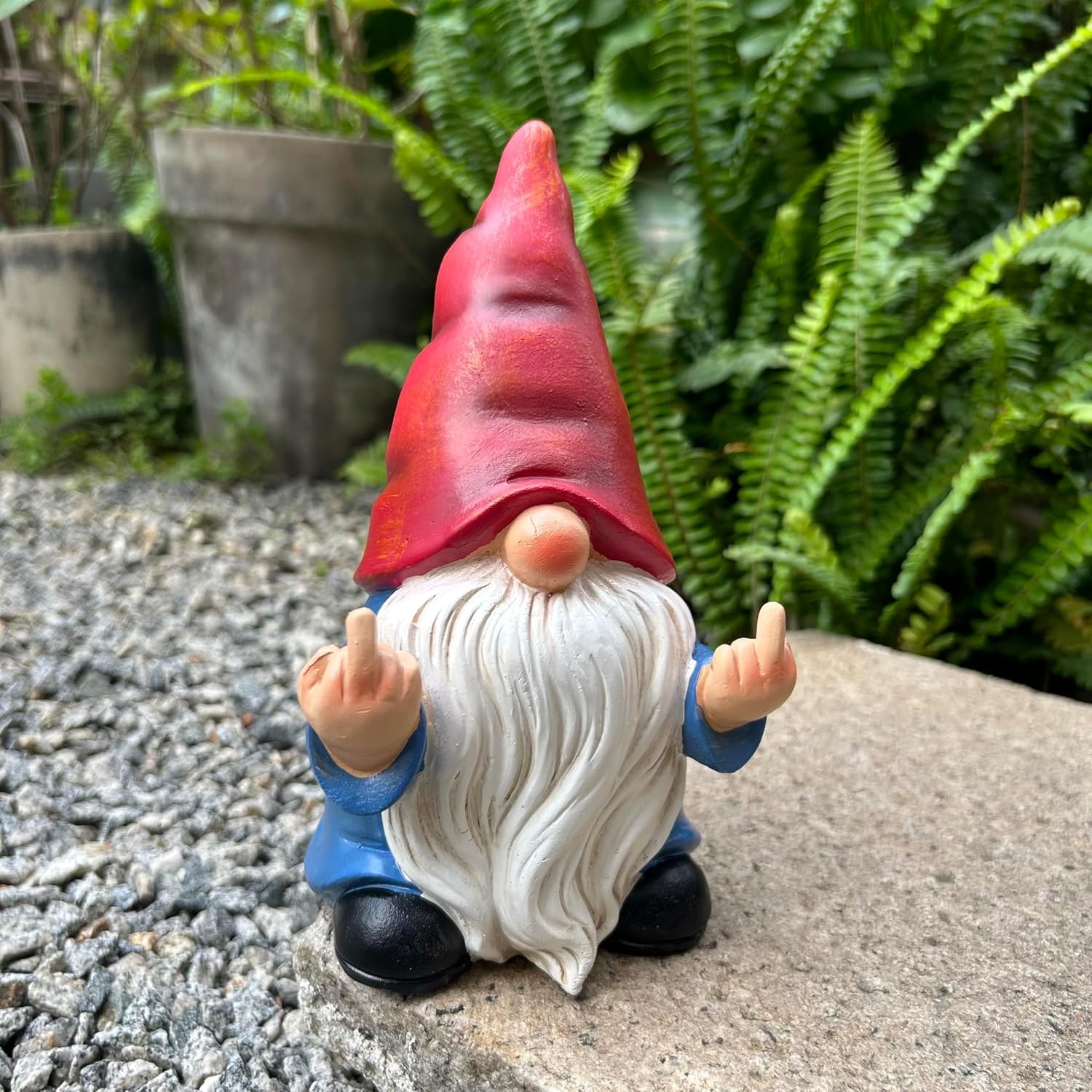 Middle Finger Gnome on porch offers playful, eye-catching decoration for outdoor spaces.