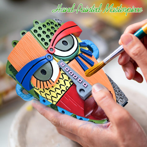 Midogaigai Abstract Face Pot decorates indoor spaces with whimsy.