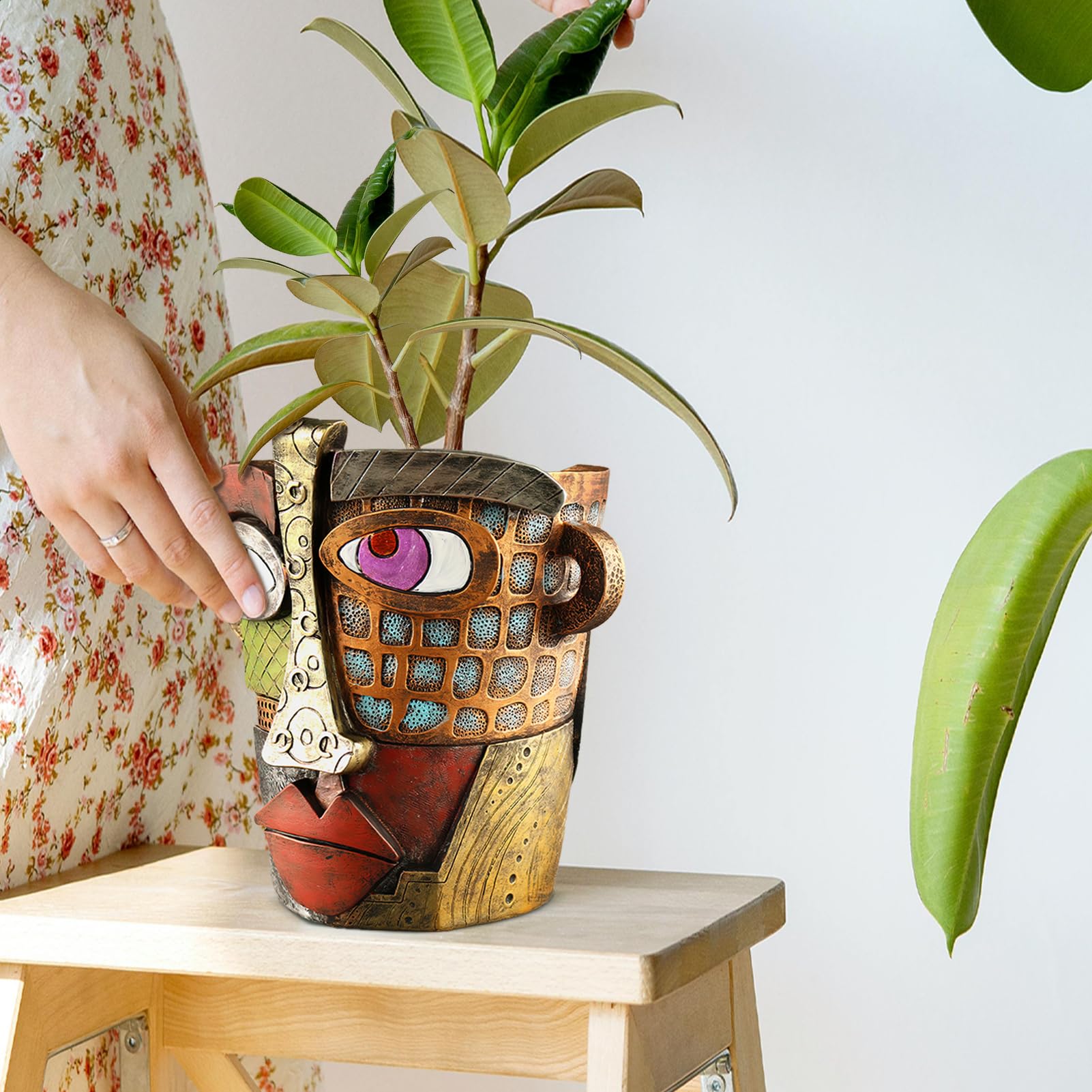 Midogaigai abstract face pot makes a thoughtful gift for plant lovers