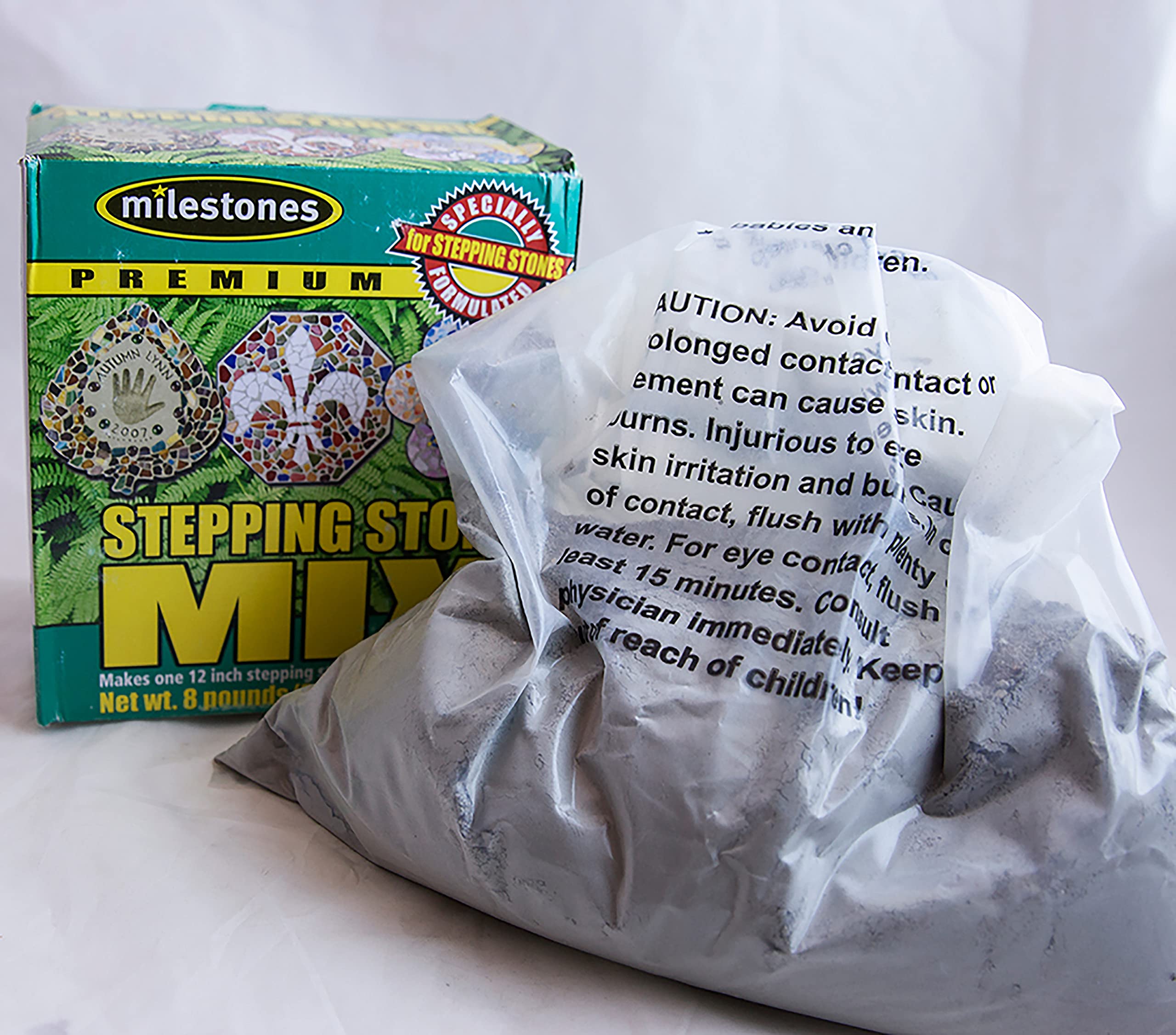 Midwest Products Milestones mix poured into a mold for a smooth stepping stone.