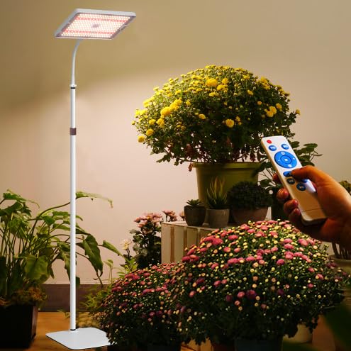 MIEEMCLUX LED grow light on a floor/table stand for versatile indoor gardening.