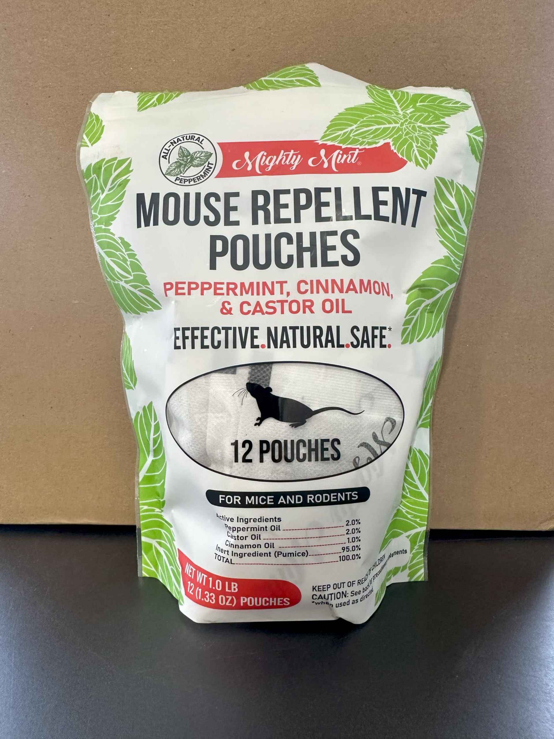 Mighty Mint pouches on a shelf highlight no-mess, poison-free rodent deterrence.