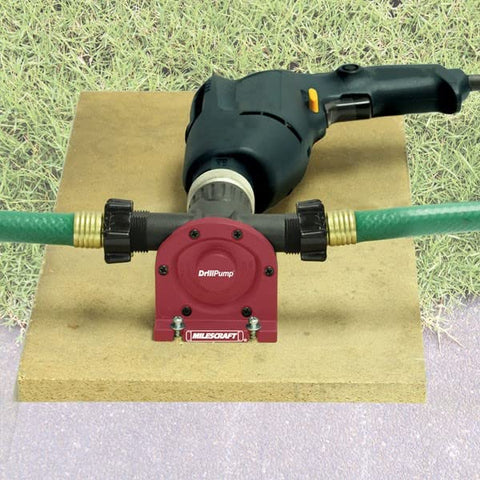Milescraft DrillPump750 in use attached to a drill for pond drainage
