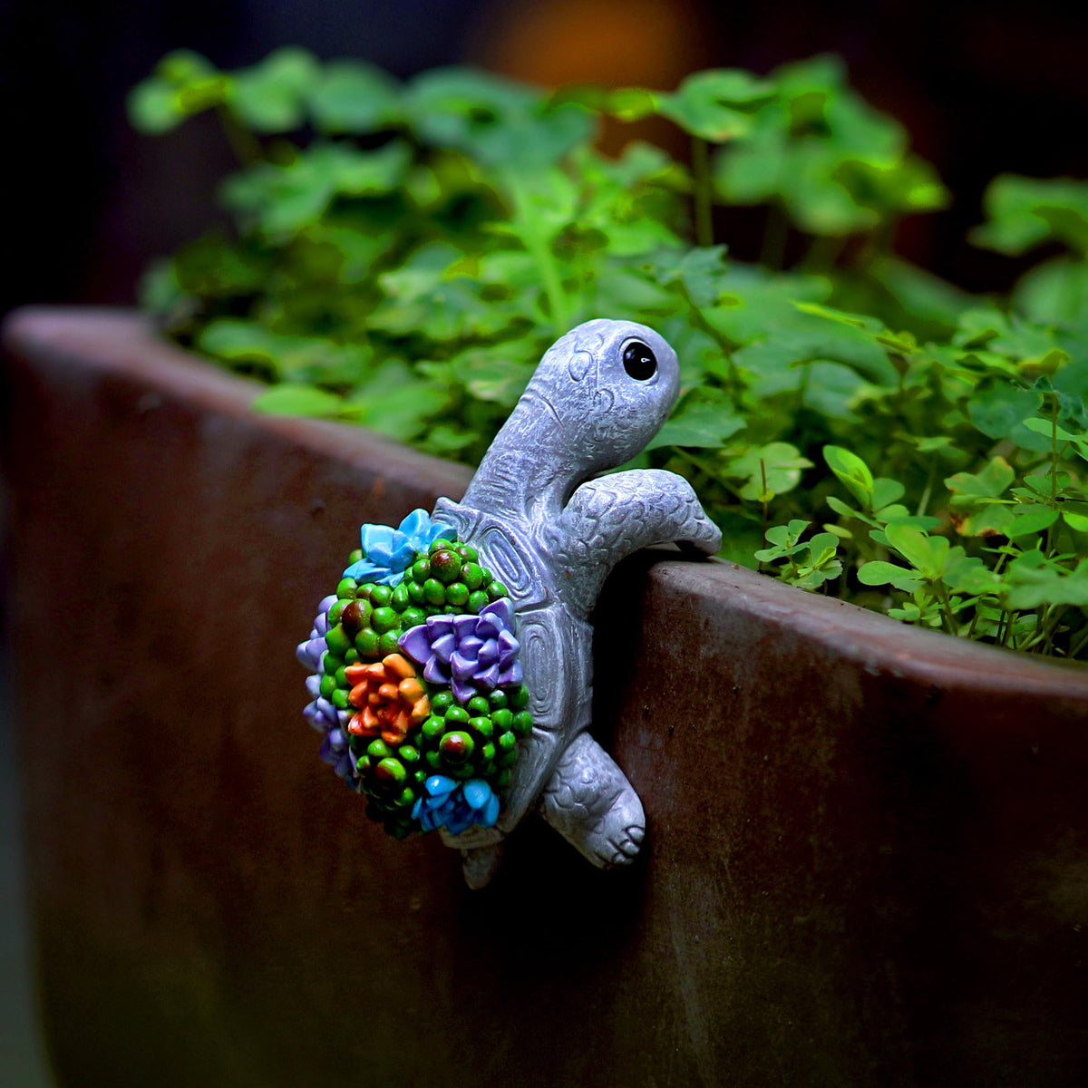 Mini Turtle Statue climbing turtle ornament adds playful charm to outdoor gardens and pots.