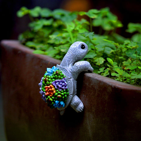 Mini Turtle Statue climbing turtle ornament adds playful charm to outdoor gardens and pots.