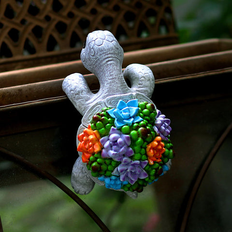 Mini Turtle Statue color pops against decks, fences, and indoor plant shelves.