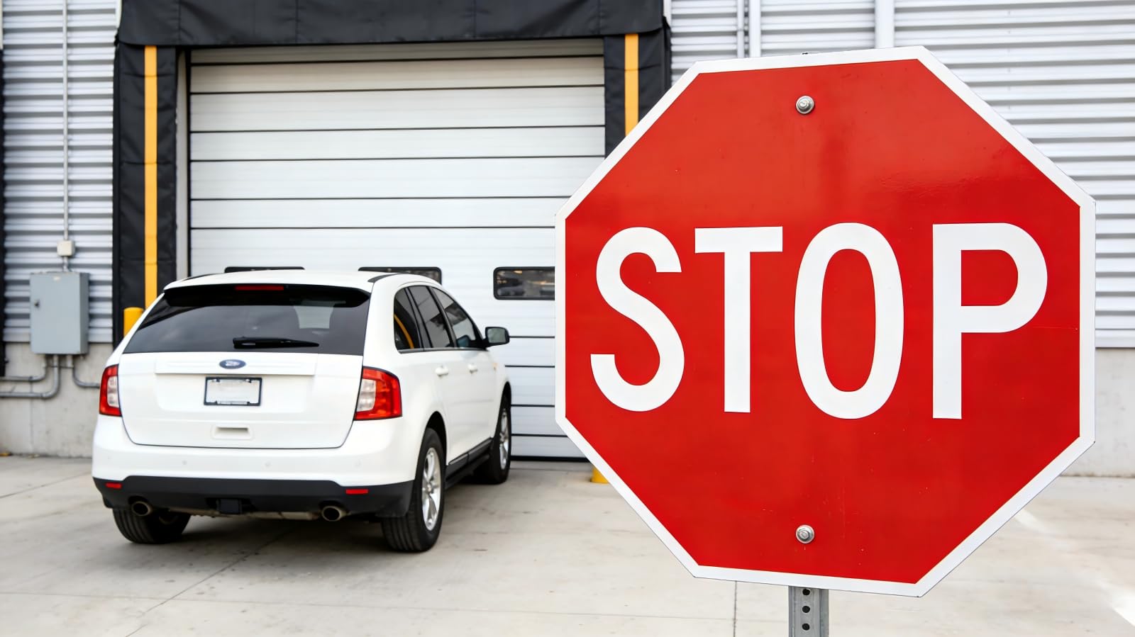 Minton stop sign weatherproof design withstands rain and wind.
