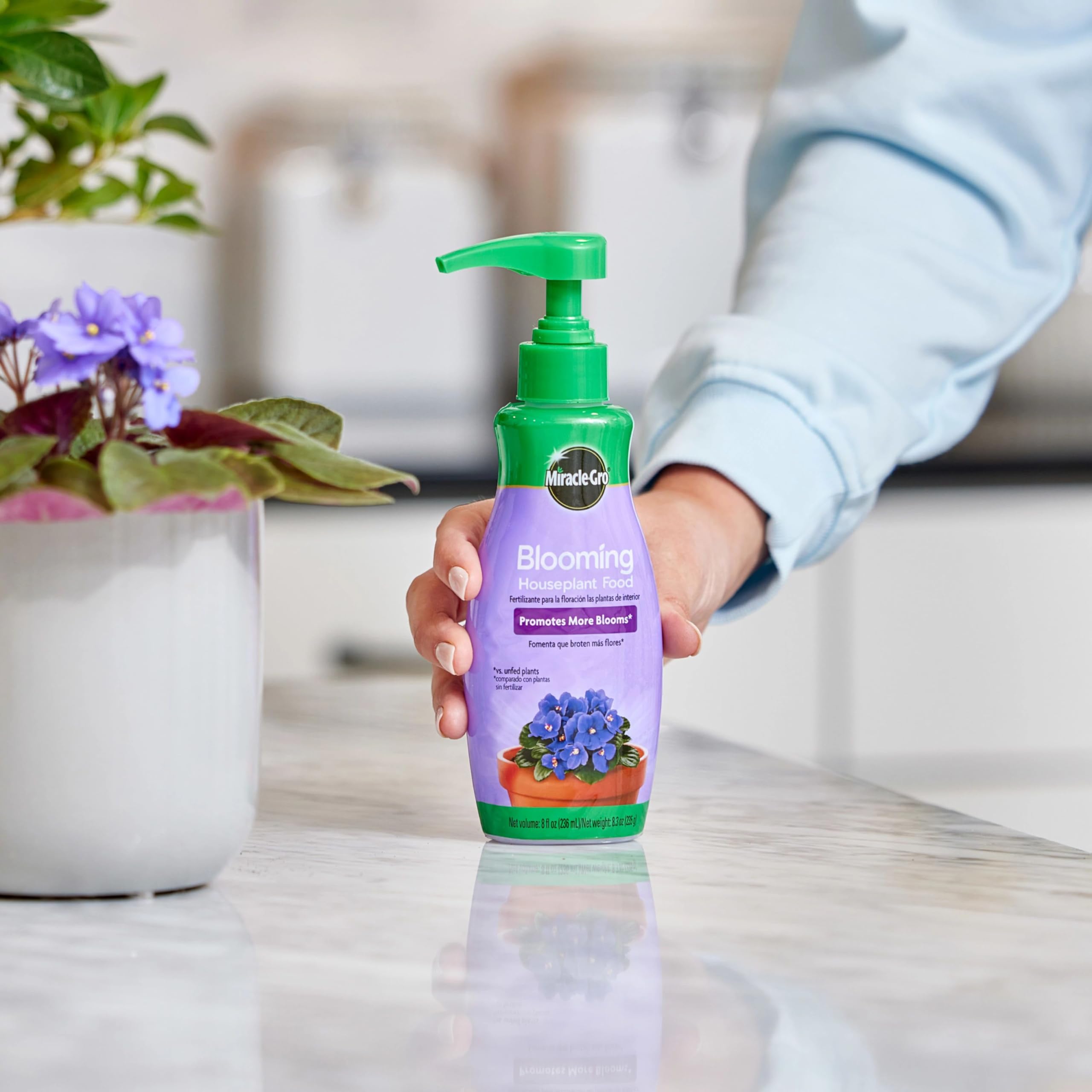 Miracle-Gro Blooming Houseplant Food watering-can-mix shows versatile use with quart-size water blends.