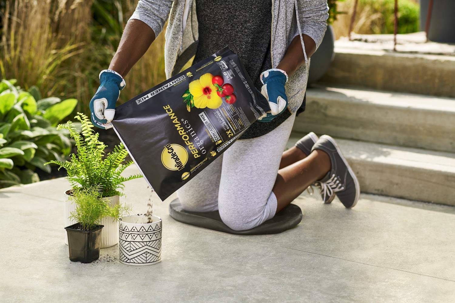 Vegetables and herbs thrive in pots with Miracle-Gro Performance Organics mix.