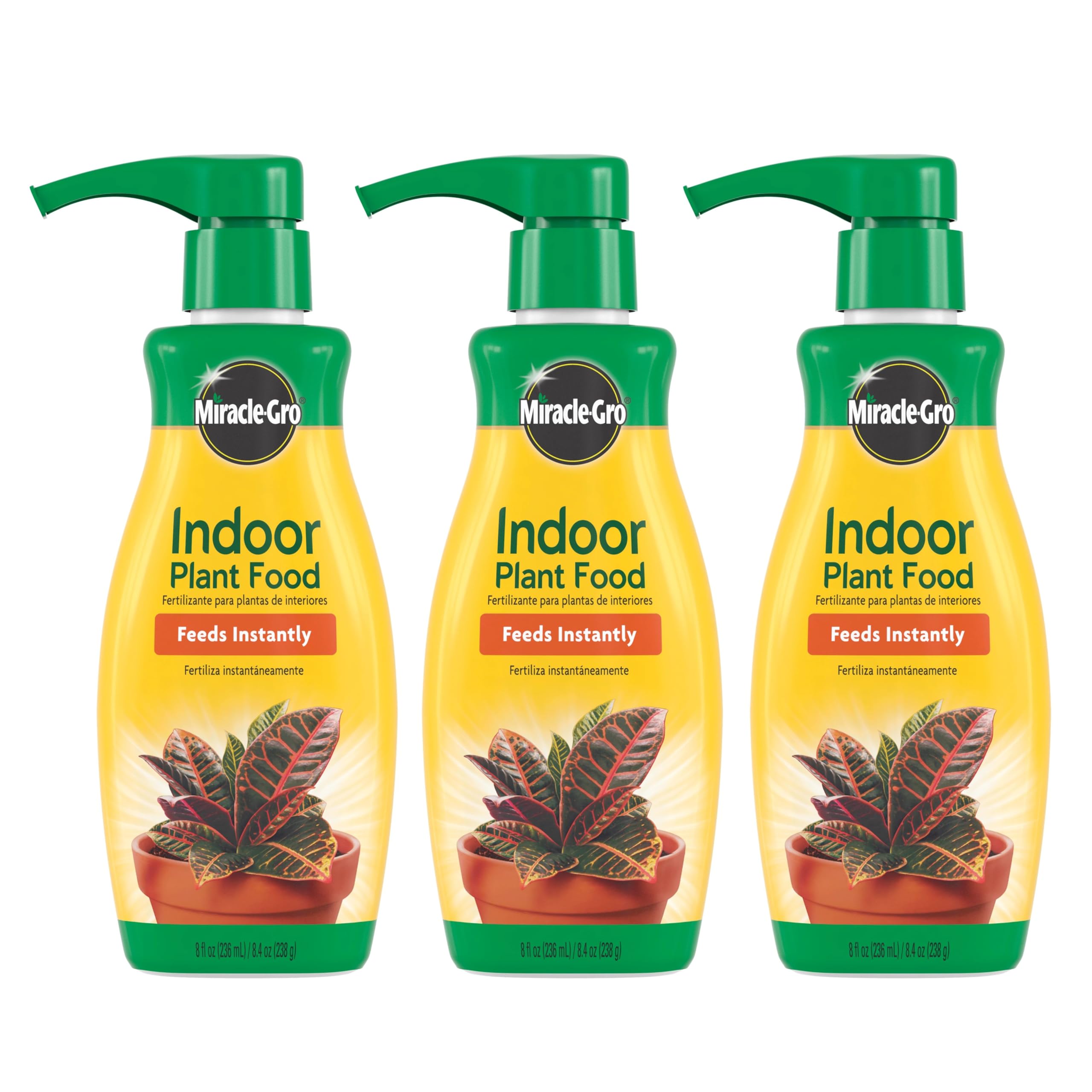Miracle-Gro Indoor Plant Food bottle pour showing instant nutrients for thriving houseplants
