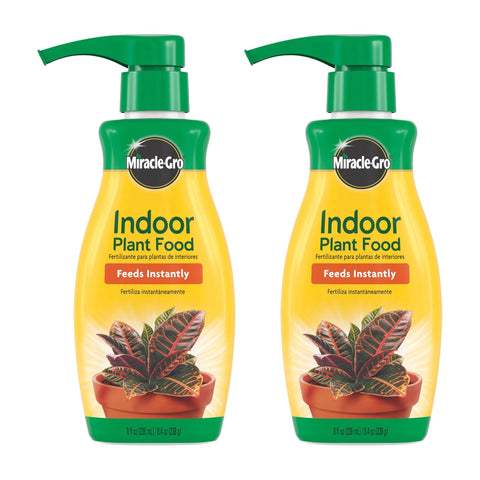Miracle-Gro Indoor Plant Food bottle pour shows easy feeding for thriving houseplants.