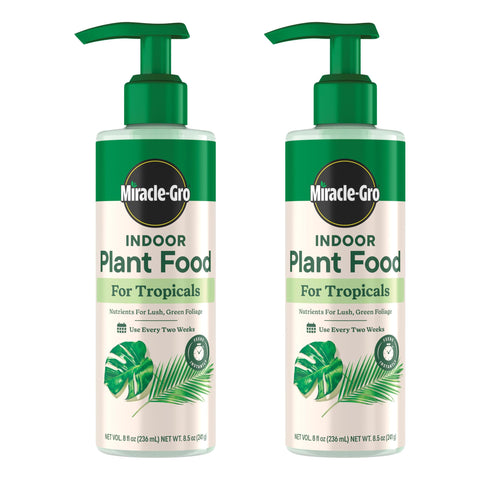 Miracle-Gro Indoor Plant Food for Tropicals bottle boosts lush foliage on tropical houseplants.