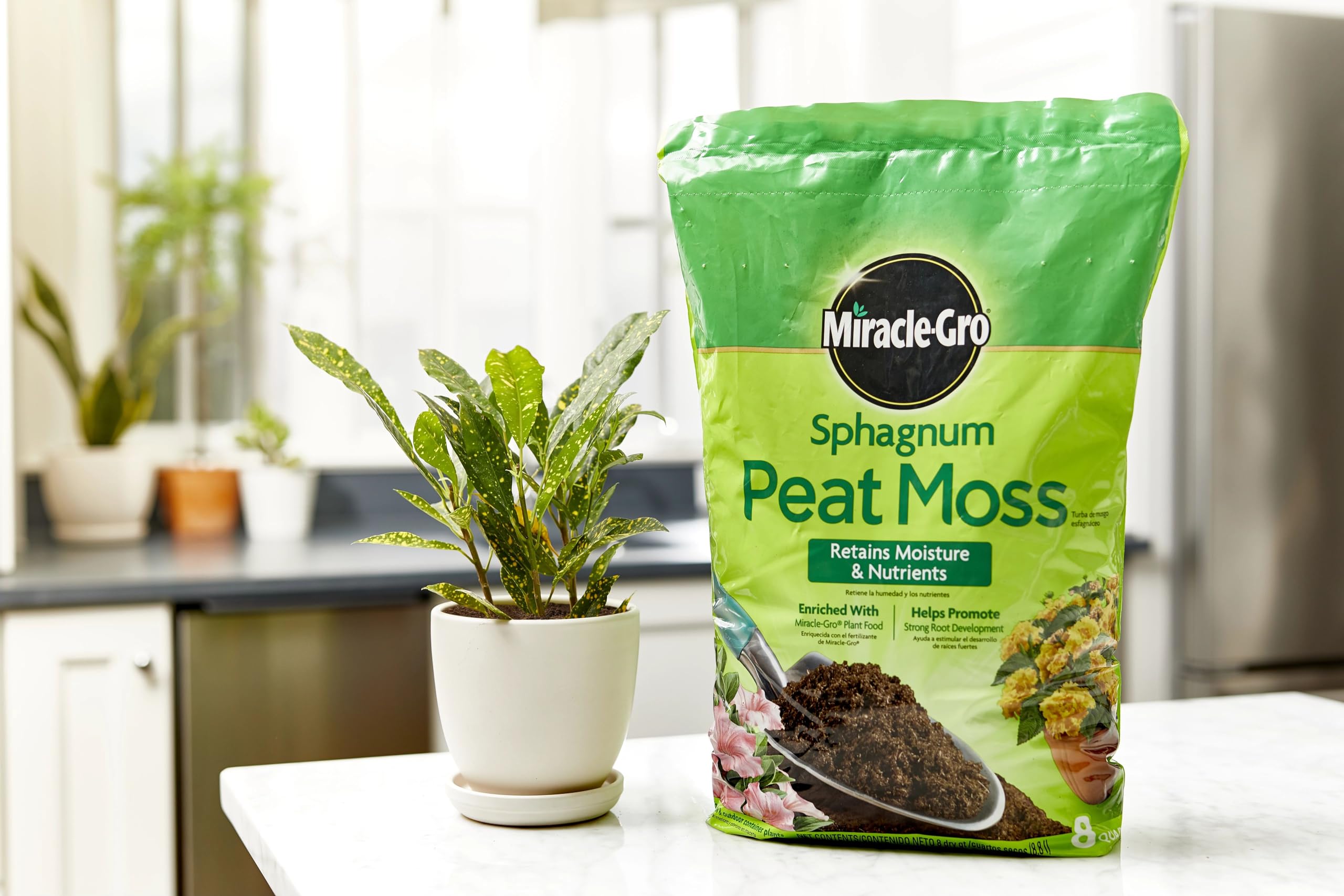 Miracle-Gro peat moss helps lighten heavy garden soil