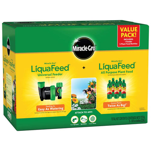 Miracle-Gro LiquaFeed universal feeder attached to spigot for effortless garden feeding.