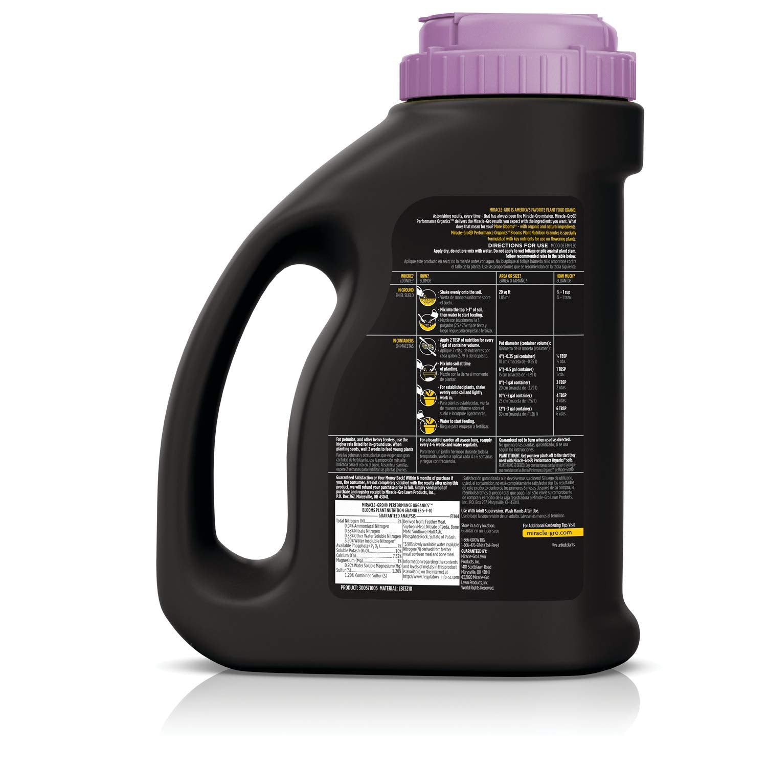 Granules sprinkled dry before watering to feed flowering plants with organic nutrients