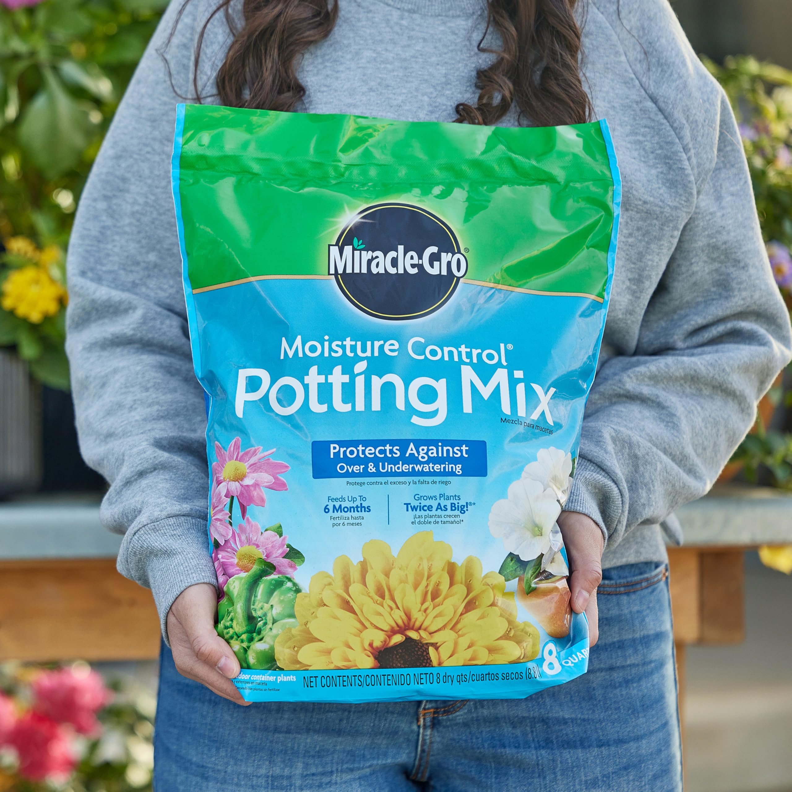 Container garden setup with Miracle-Gro Moisture Control for better moisture.