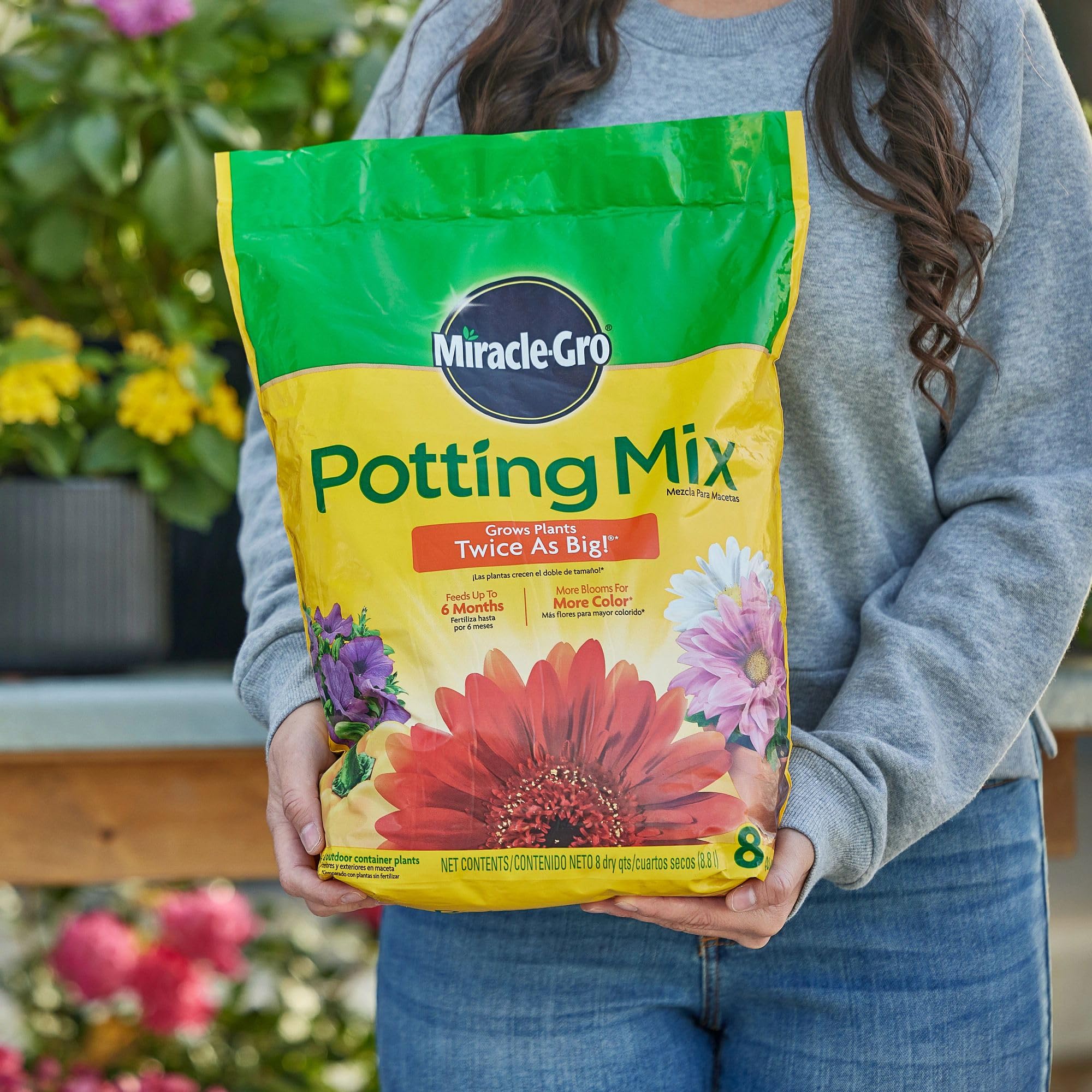 Miracle-Gro Potting Mix helps vegetables thrive in container gardens with healthy growth.