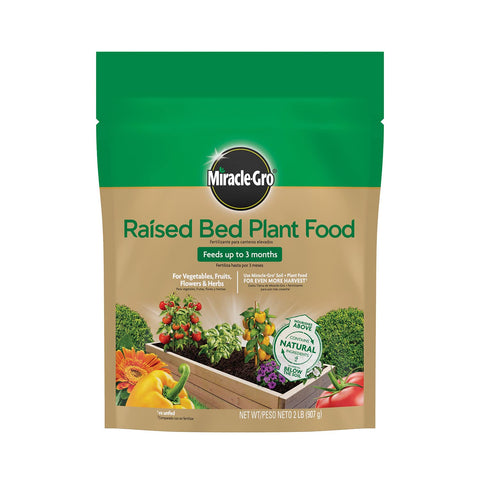 Miracle-Gro Raised Bed Plant Food bag shows long-lasting garden nourishment.