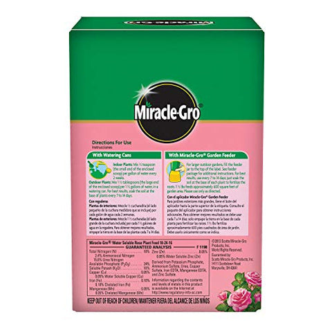 Miracle-Gro Rose Food dissolving in water for easy mixing.