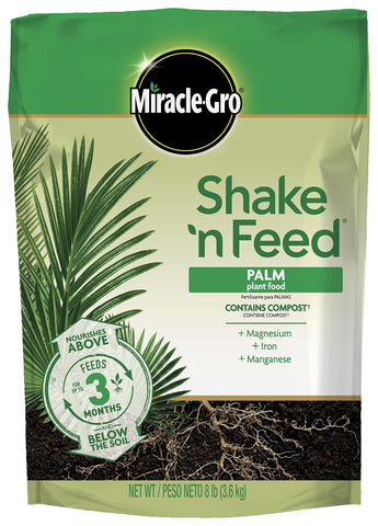 Miracle-Gro Shake 'N Feed Palm Plant Food bag boosts lush palm growth