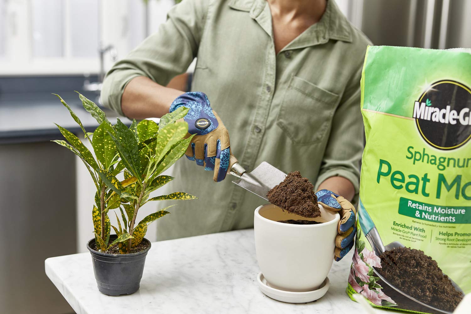 Miracle-Gro Sphagnum Peat Moss mixed into heavy soil for easier workability.