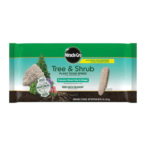 Miracle-Gro Tree & Shrub Spikes placed around the dripline to feed roots for healthier trees.