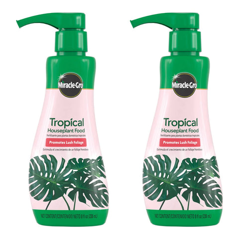 Miracle-Gro Tropical Houseplant Food bottle pour demonstrates quick, even feeding for tropical foliage.
