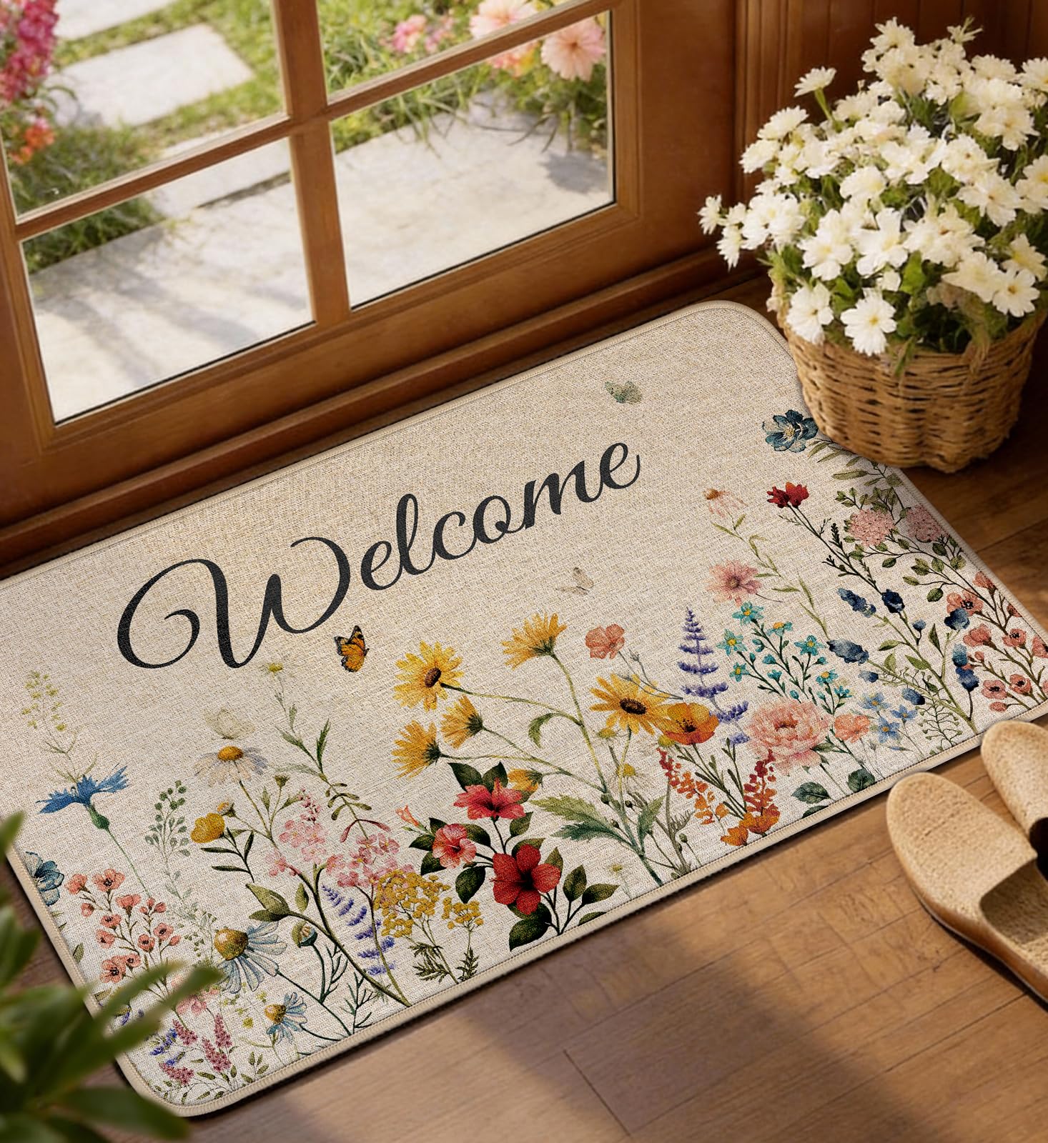 Miss Adola Welcome Floral Door Mat with wildflowers at the entry and dirt-trapping backing.