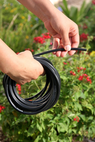 Mister Landscaper tubing extends drippers for flexible irrigation routing.